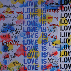 The word love graffitied on a wall